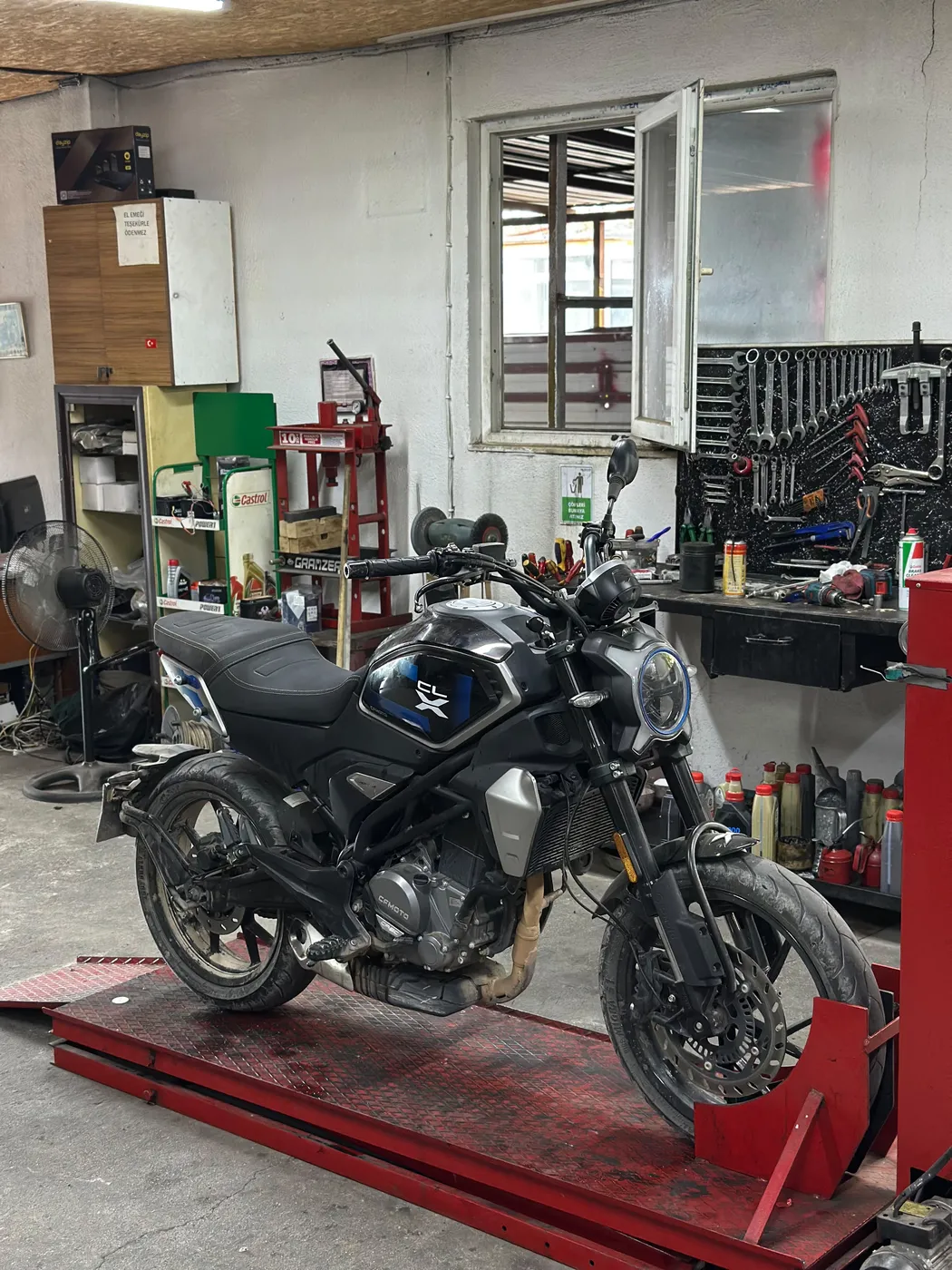CFMoto CL-X being serviced at Kral Motor workshop